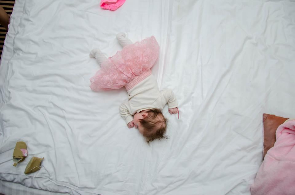 baby on bed